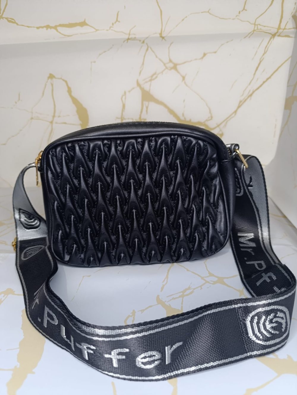 CrossBody con Relieve